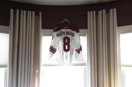 A jersey worn by Boston native and Phoenix Coyotes player Keith Yandle was in the living room of the Richard's family home in Dorchester.
